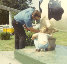 milking a plastic cow